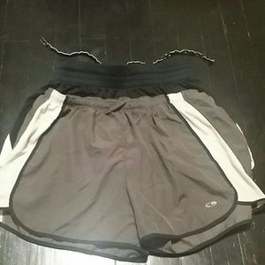 Two pairs of Champion women's running shorts.